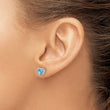 Sterling Silver Rhodium-plated Blue Topaz and Diamond Earrings - Birthstone Company