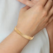 14K Two-tone Dia-cut and Textured with Safety Chain Bangle