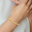 14K Polished and Diamond-cut Hinged Bangle - Birthstone Company