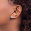 Sterling Silver Rhodium-Plated Blue Topaz Floral Earrings Elegant Lightweight Design - Birthstone Company