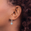 Sterling Silver Rhodium-Plated Diamond and Blue Topaz Drop Earrings Polished Finish - Birthstone Company