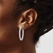 Sterling Shimmer Sterling Silver Rhodium-plated 54 Stone 2.5mm CZ In and Out Oval Hinged Hoop Earrings - Birthstone Company