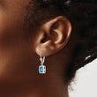 Sterling Silver RH Plated 7x5 Emerald Cut Blue Topaz Leverback Earrings - Birthstone Company
