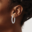Sterling Shimmer Sterling Silver Rhodium-plated 34 Stone 3.0mm CZ In and Out Oval Hinged Hoop Earrings - Birthstone Company