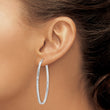 Sterling Silver Rhodium-plated Diamond-cut 2mm Oval Hoop Earrings