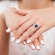 Sterling Silver Rhodium-plated Created Blue Sapphire and CZ Ring - Birthstone Company
