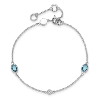 White Ice Sterling Silver Rhodium-Rhodium-Plated 7.5 inch Diamond and Blue Topaz Bracelet with 1.25 inch Extender - Birthstone Company