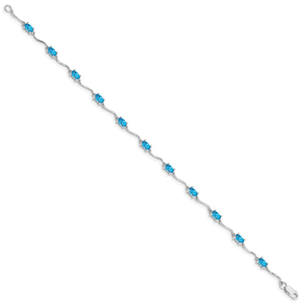 Sterling Silver Rhodium-plated Blue Topaz Bracelet - Birthstone Company