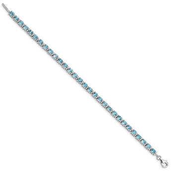 Sterling Silver Rhodium-plated Blue Topaz and Diamond Bracelet - Birthstone Company