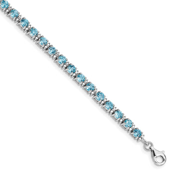 Sterling Silver Rhodium-plated Blue Topaz and Diamond Bracelet - Birthstone Company