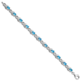 Sterling Silver Rhodium-plated Blue Topaz Bracelet - Birthstone Company