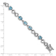 Sterling Silver Rhodium-plated Oval Heart Blue Topaz Bracelet - Birthstone Company