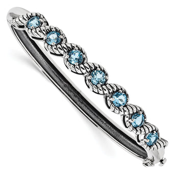 Sterling Silver Rhodium-plated Light Swiss Blue Topaz Hinged Bangle - Birthstone Company