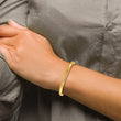 Chisel Titanium Polished Yellow IP-plated 5mm Hinged Bangle