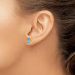 14k 7x5mm Oval Blue Topaz Earrings - Birthstone Company