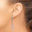 14k White Gold Blue Topaz Dangle Earrings - Birthstone Company