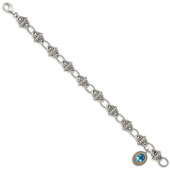 Sterling Silver 14K Gold SwiSterling Silver Blue Topaz Bracelet
